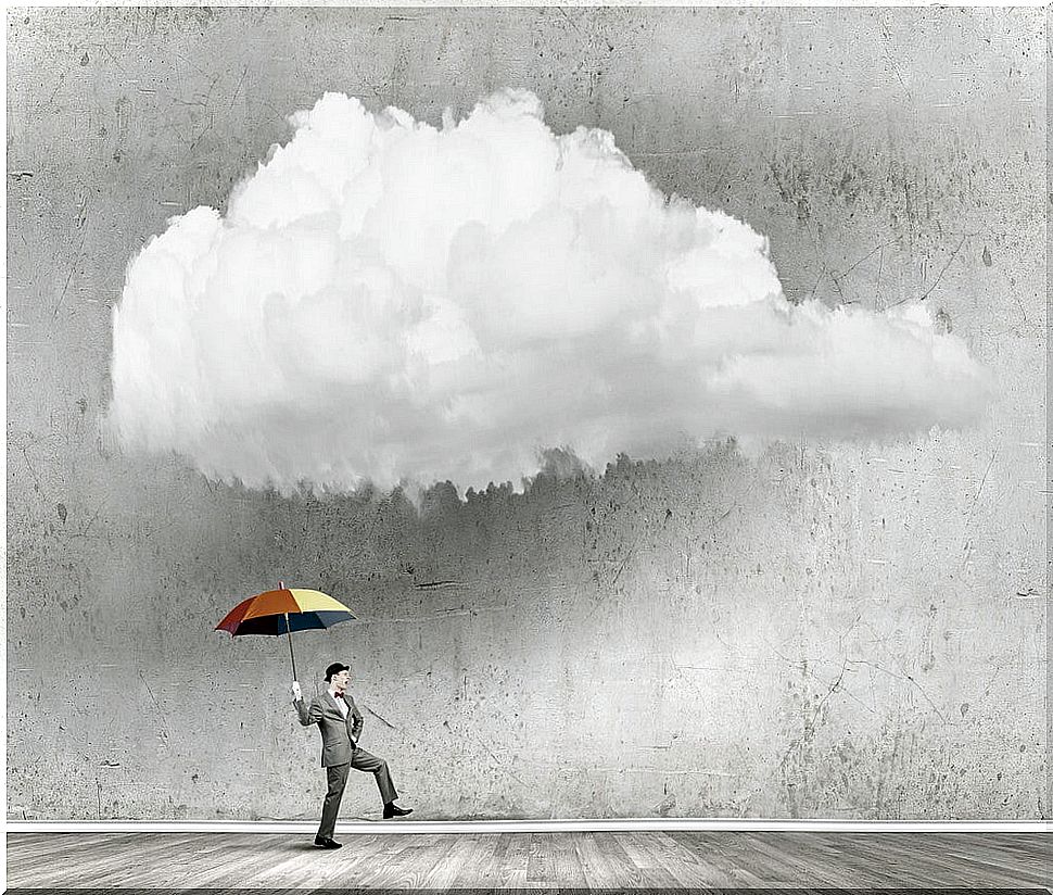 Man with an umbrella being optimistic