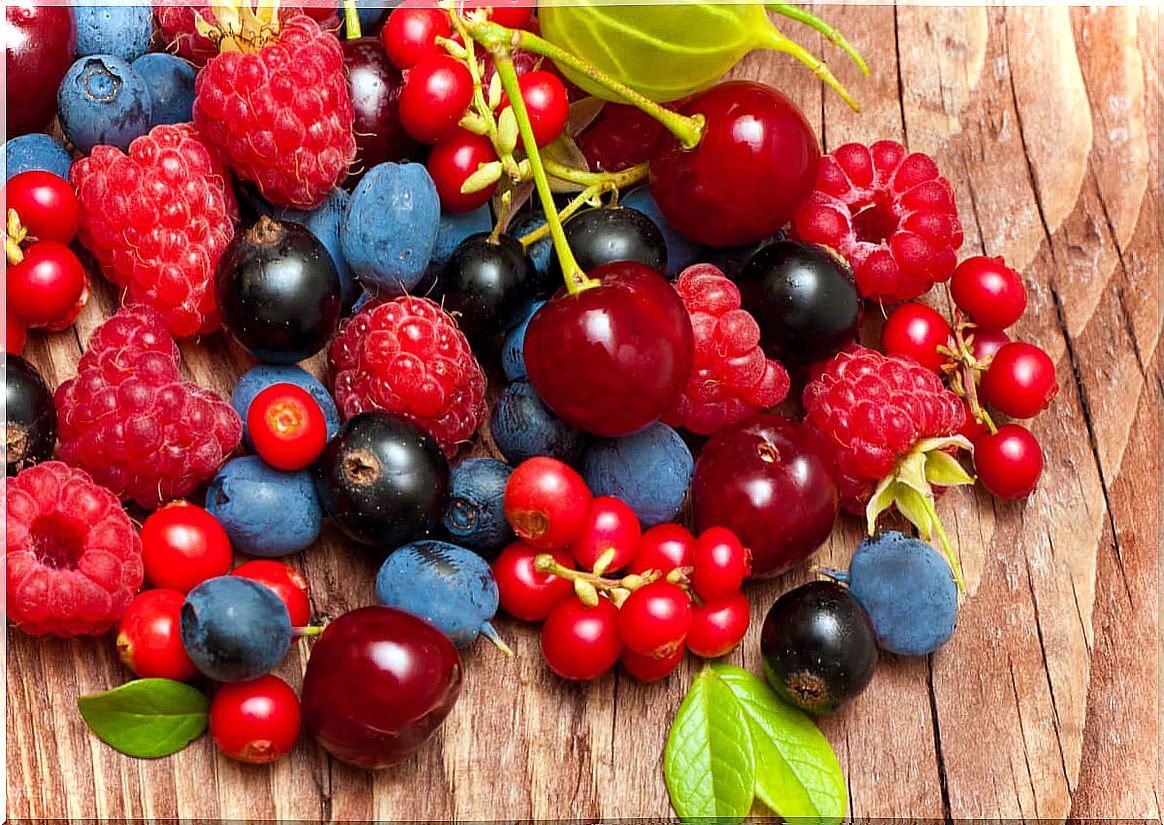 Assorted red fruits.