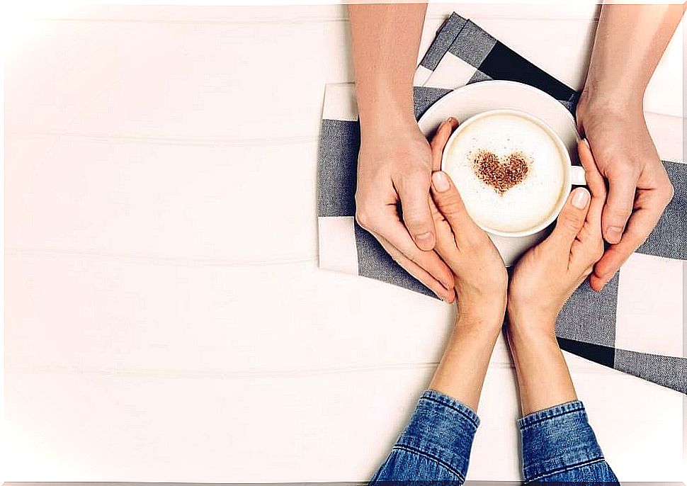 Couple sharing a coffee.