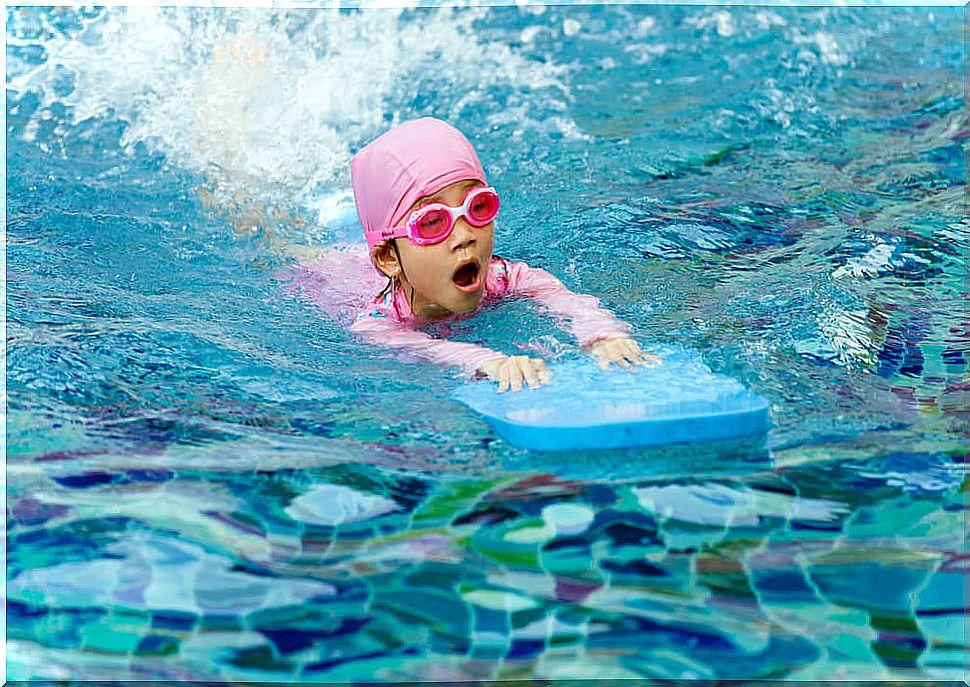 Girl practicing swimming