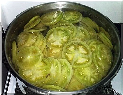 potted green tomatoes