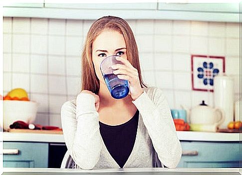 Woman drinking a glass of water