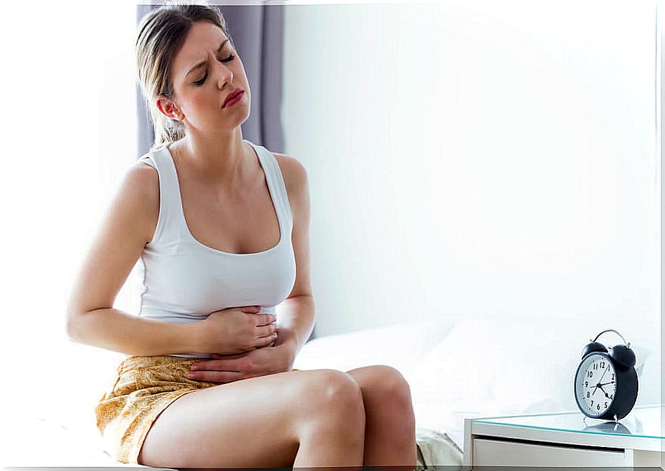 Woman suffering from dysmenorrhea