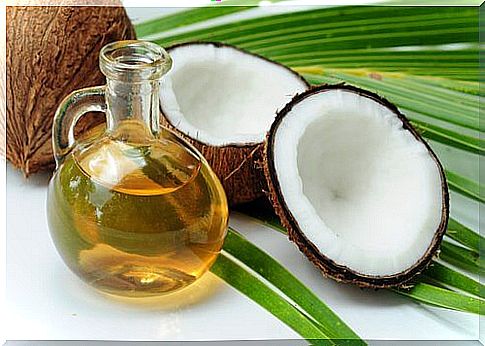 Coconut oil and a cracked coconut