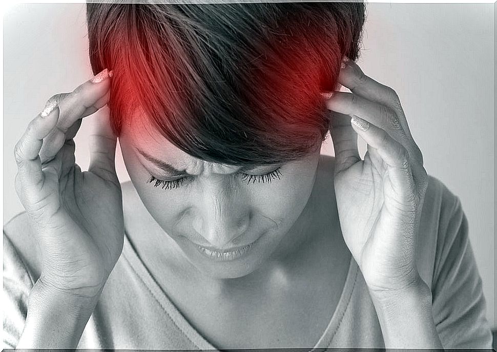 Woman with migraine